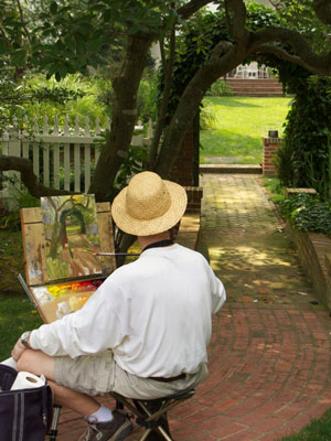 Photo of Robert painting sun dapples at the Easton Brunch