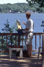 Photo of Robert painting by Hamlin Lake in Michigan