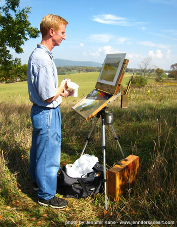 Photo of Robert flattening some grass and making the hmmmm face